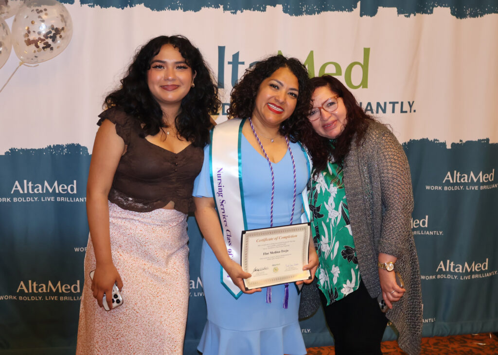 nursing graduate with family