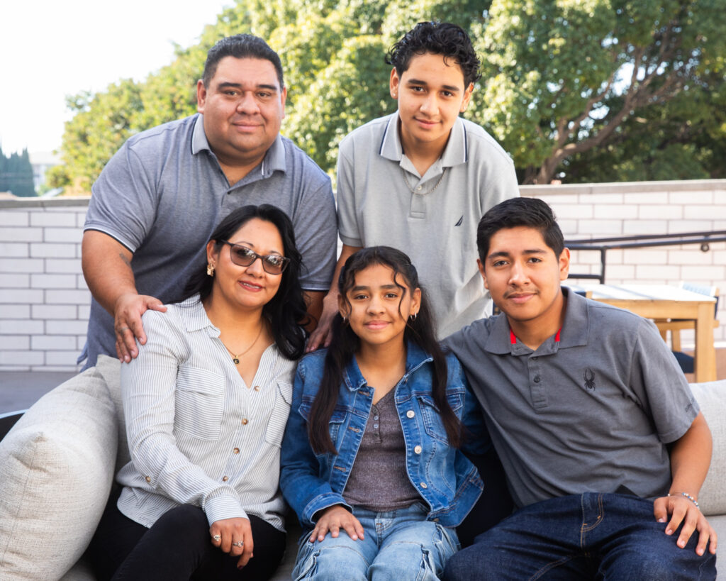 Alberto with his wife and three kids