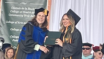 Jessica receiving her diploma