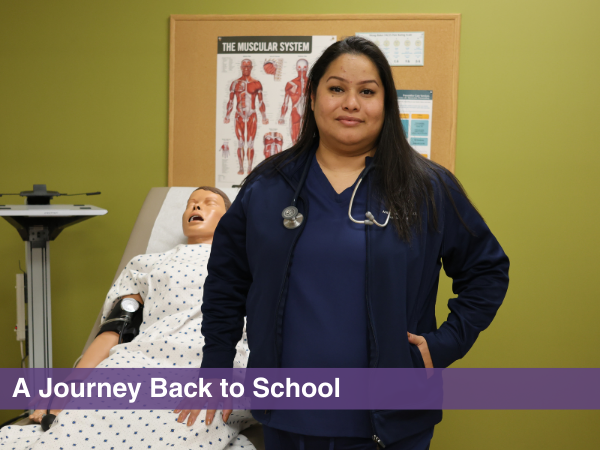 woman standing in front of manikin