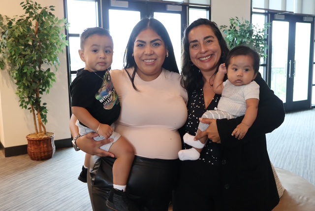 doctor with mom and two babies